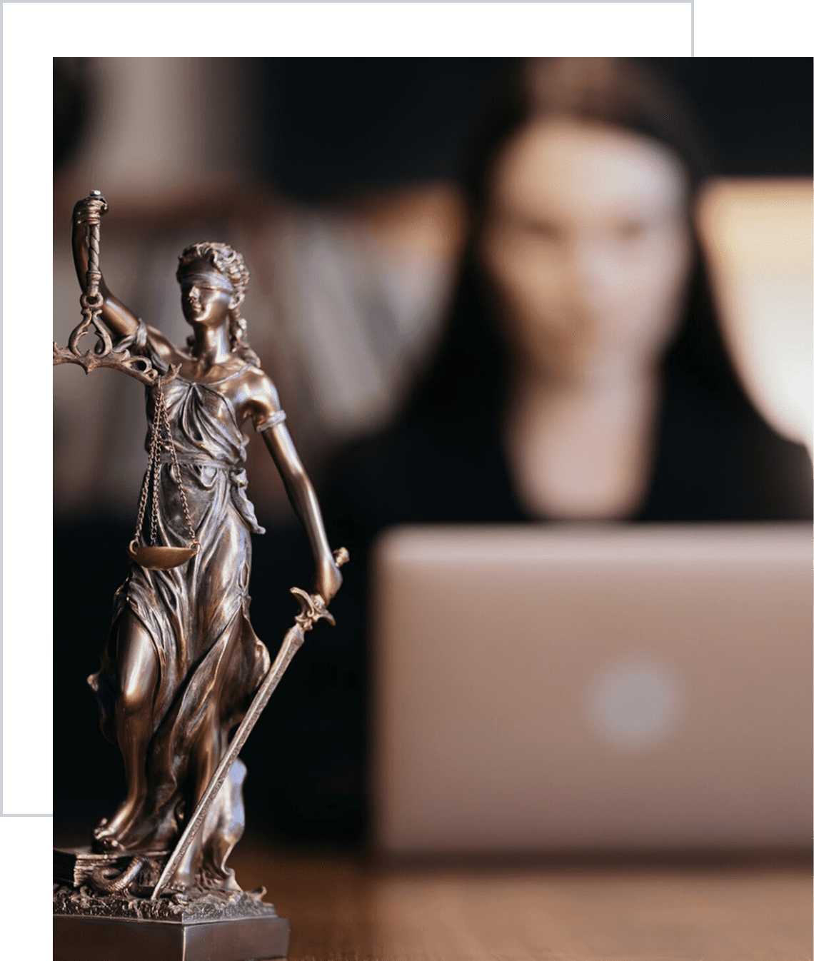 Justice statue in office setting